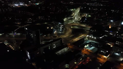 Aerial night view pull back over Keilaniemi Business District and Highways Stock Footage 336296360