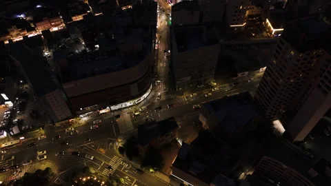 Aerial night view rotating over busy intersection in Busan, South Korea Video stock 347364690