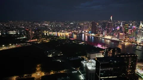 Aerial Night View of Saigon Skyline and Ba Son Bridge in Ho Chi Minh City Stock Footage 340973498