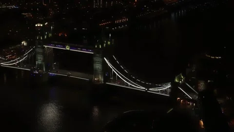 Aerial night view of Tower Bridge over river Thames in London Stock Footage 131968117