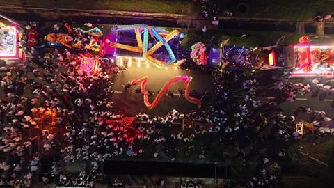 Aerial Nighttime Deity Procession and Dragon Dance in Bukit Bakri Stock Footage 345437618