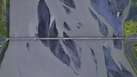 Aerial No Camera Movement Looking Down View Of Bridge Across Large River Braid Stock Footage 257051454