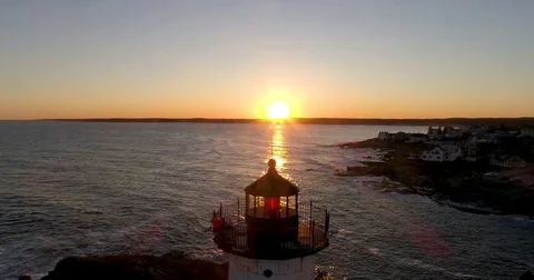 Aerial Nubble Lighthouse - Sunset - York Maine - Closeup Sun Behind Stock Footage
