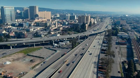 Aerial: Oakland City Skyline & freeway. California, USA Stock Footage