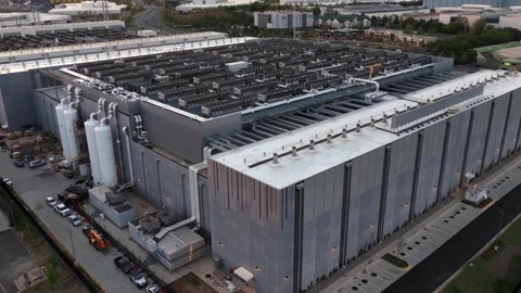Aerial oblique view of hyperscale data center in Ashburn, Virginia with dense Stock Footage 333701258