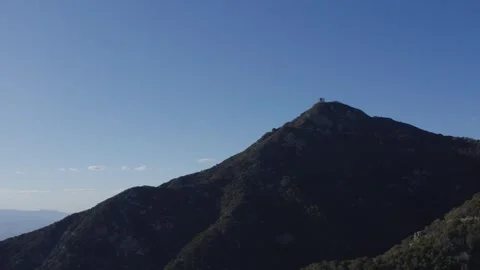 Aerial of an observatory on a mountain top Stock Footage 274143366