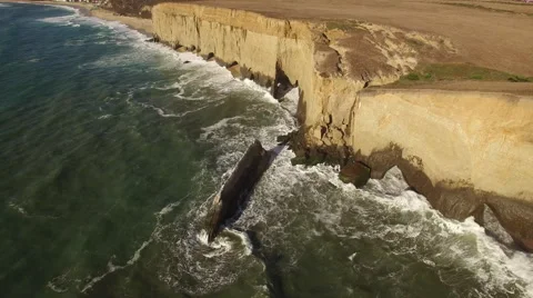 Aerial of Ocean and Sandy Cliffs Stock Footage 68381288