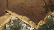 Aerial Of Ocean And Sandy Cliffs Stock Footage