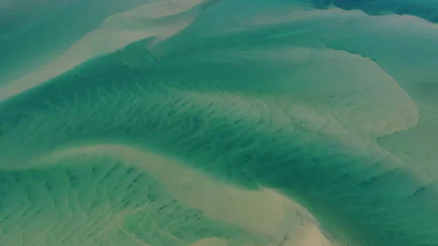Aerial of Ocean Currents Creating Abstract Patterns in Sand on Cape Cod, MA Stock Footage 341991196
