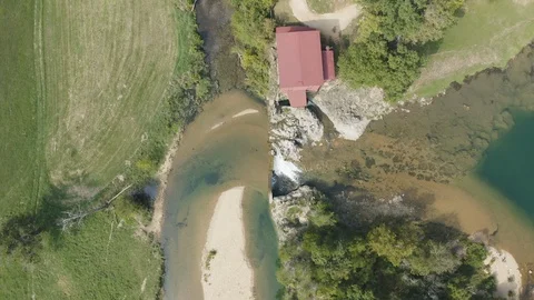 Aerial of old mill and stream 스톡 동영상 109461989