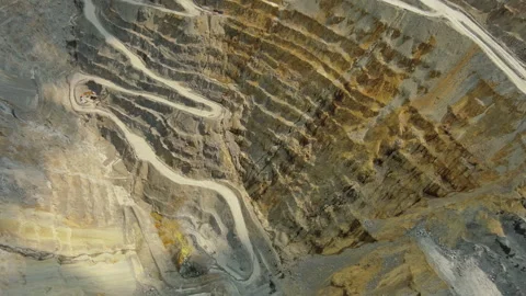 Aerial of open mine and heavy mining equipment Stock Footage 337143634