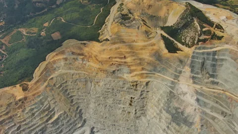 Aerial of open mine and heavy mining equipment Stock Footage 344743260