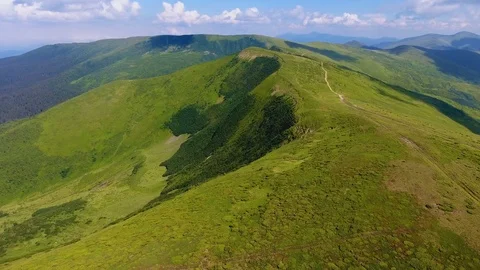 Aerial of an optimistic mountain with a long path in the Carpathians in summer Stock Footage 93730882