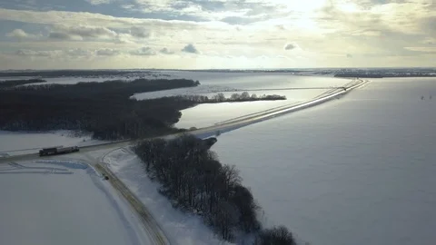 Aerial or top view from drone to winter asphalt   road in countryside with ca Stock Footage 101332019