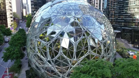 Aerial orbit of Amazon Spheres at Amazon Corporate Headquarters in Seattle with Stock Footage 335895611