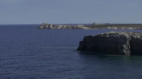 Aerial, Orbit, and Pan of a Lone Horse on a Greek Island - A Masterful Blend Stock Footage 254084526