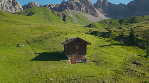 Aerial Orbit Around Alpine Cabin in Valfredda Dolomites Stock Footage 336893336