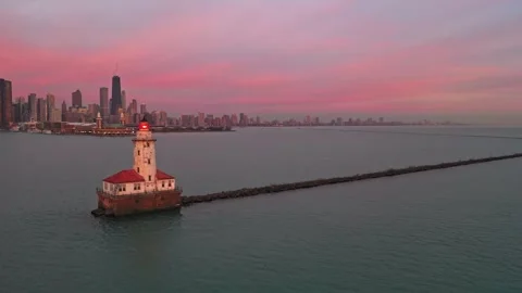 Aerial Orbit Around Chicago Lighthouse Revealing Skyline at Sunrise Stock Footage 342814709