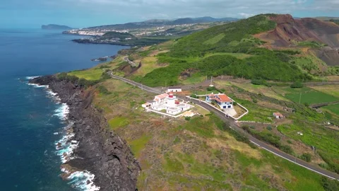 Aerial Orbit Around Coastal Lighthouse on the Azores Islands Portugal in 4K Stock Footage 335997147