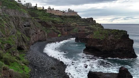 Aerial Orbit Around Playa de los Roques at Sunset Tenerife Stock Footage 329483890