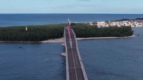 Aerial orbit around Thuan An Bridge main tower 4K Stock Footage 339860976