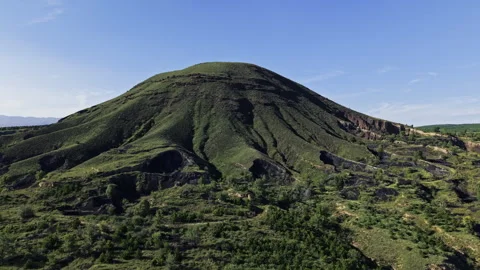 Aerial Orbit Around Vegetated Cinder Cone Volcano Slopes 4K HLG Stock Footage 344008246