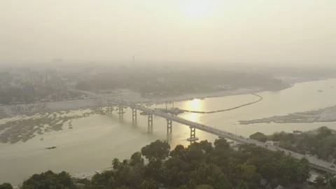 Aerial Orbit of Bridge During Sunset in Kushtia Bangladesh Stock Footage 142026742