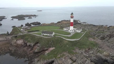 Aerial orbit of Buchan Ness Lighthouse at Boddam near Peterhead, Scotland Stock Footage 341358158