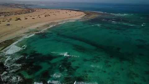 Aerial orbit clip of Flag Beach Corralejo Fuerteventura Stock Footage 176832902