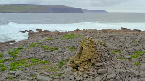 Aerial Orbit of Constabulary Outpost with Cliffs of Moher Backdrop 스톡 동영상 313129133