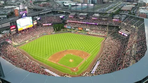Aerial Orbit of Coors Field During Colorado Rockies Game at Sunset, Denver 動画素材 218638071