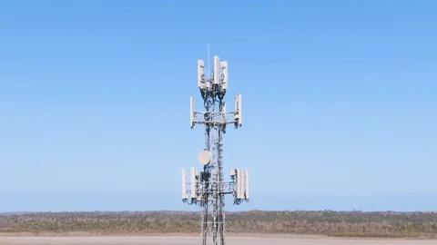 Aerial Orbit: Footage of 5G tower with blue sky Stock Footage