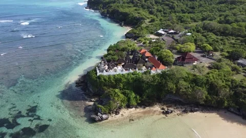 Aerial orbit left around temple at Geger Beach, Bali Stock Footage 329077313