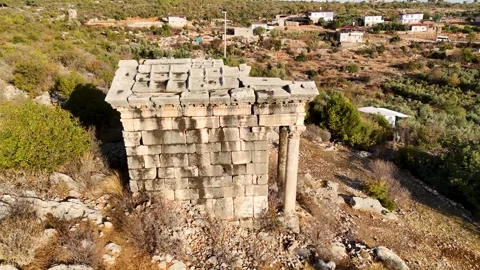 Aerial Orbit Left View of Ancient Twin Stone Mausoleums in Demircili, Turkey Stock Footage 324135508