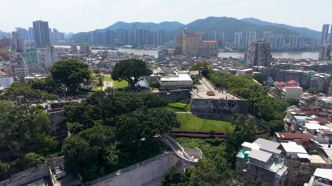 Aerial orbit of Macau Museum and Mount Fortress with City Skyline Stock Footage 340183343
