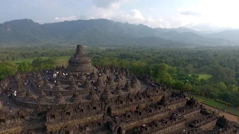 Aerial Orbit Medium Shot Borobudur Scenic Mountain Background Partly Cloudy Sky Stock Footage 323992673