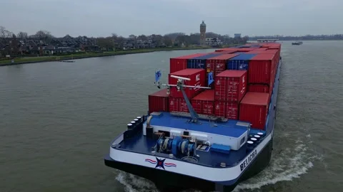 Aerial Orbit Motion Shot Off Forward Bow Of Belicha Inland Freighter Vídeos de archivo 233857104