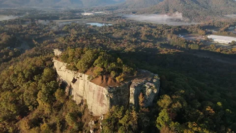 Aerial orbit of a mountain cliff in the Ozark forest of Arkansas Stock Footage