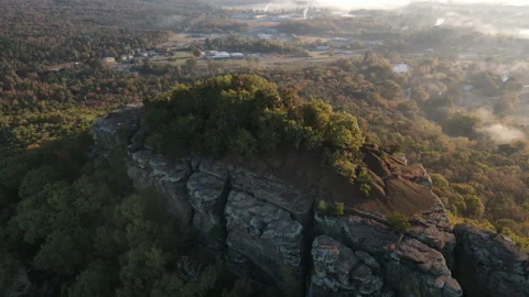Aerial orbit of a mountain cliff in the Ozark forest of Arkansas Stock Footage 146353085
