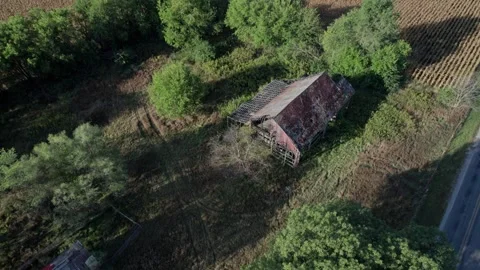 Aerial orbit of an old run-down barn Stock Footage 318990119