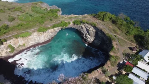 Aerial orbit over Broken Beach entrance Stock Footage 329384058