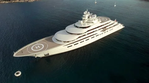 Aerial orbit over the Dilbar, a third-biggest private luxury yacht belongs Stock Footage 172004082