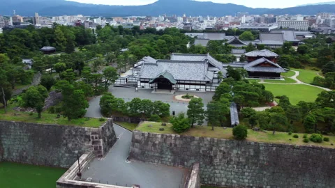 Aerial Orbit Over Nijo Castle Grounds and Traditional Buildings in Kyoto, Japan 動画素材 337652381