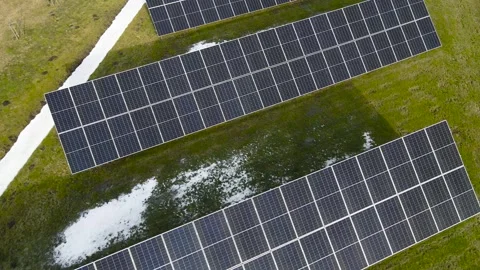 Aerial Orbit Over Solar Panel Array With Melting Snow Patches Stock-Footage 332054619
