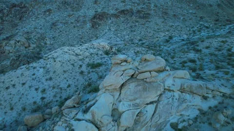 Aerial orbit over unique rock formations in the Nevada desert Stock Footage 205048857