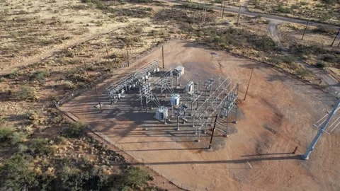 Aerial orbit of a power sub station and electrical distribution complex Stock Footage 168074035