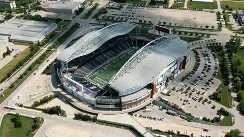 Aerial Orbit of Princess Auto Stadium Revealing Football Field in Winnipeg Stock Footage 341050137
