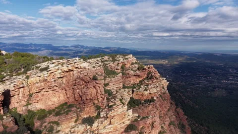Aerial orbit reveals dramatic sandstone cliffs at Mirador de Garbi Video stock 326035230