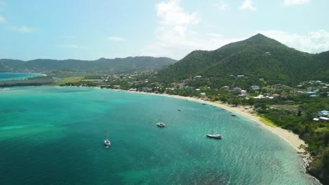 Aerial orbit right around anchored sailboats at Paradise Beach Carriacou Stock-Footage 343898655
