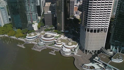 Aerial orbit shot of the iconic Eagle Street Pier in Brisbane CBD Stock Footage 210306434